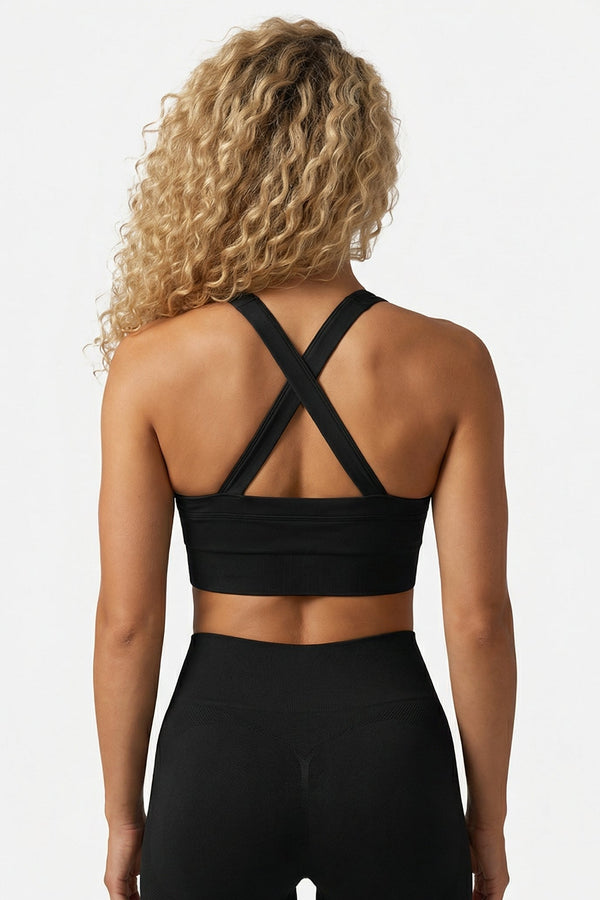 AirMotion Crossback Sports BH – sort, krydsryg, medium støtte, bred elastisk underkant